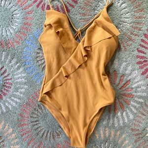 Bathing suit. NWT. Adorable Cupshe yellow , front ruffle & adjustable straps.